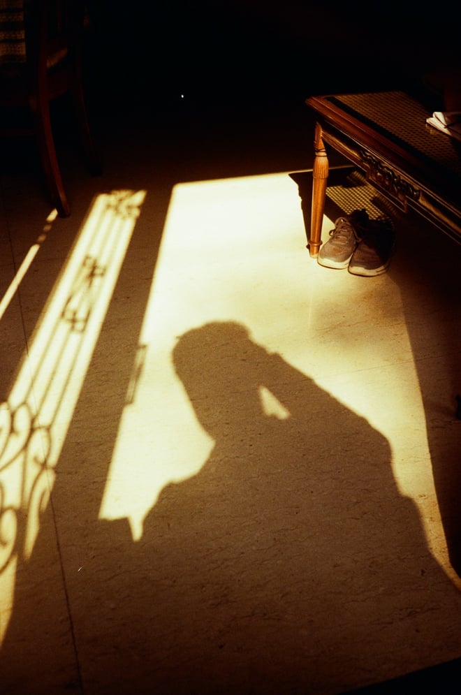 Photo of R's shadow, shot on film
