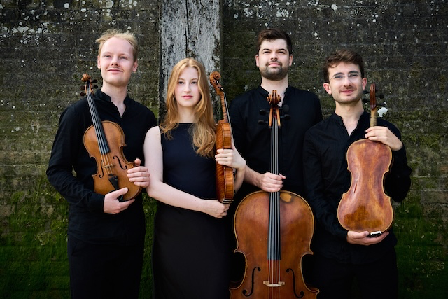 Four musicians with their instruments; violins, cello and viola.