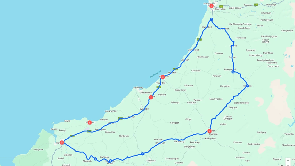 Map of Ceredigion showing circular path of Meadow Ring Road and 6 red dots indicating primary schools