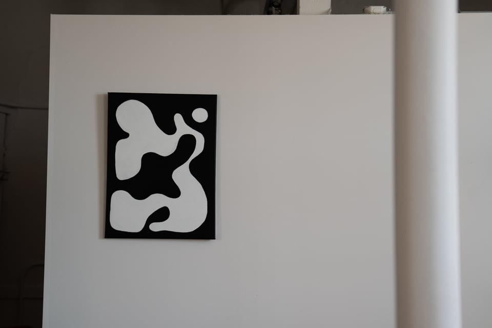A piece of art on a wall.
