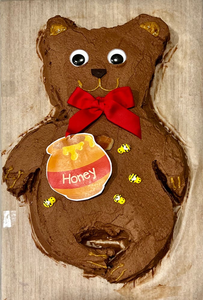 a great teddy bear cake with googly eyes