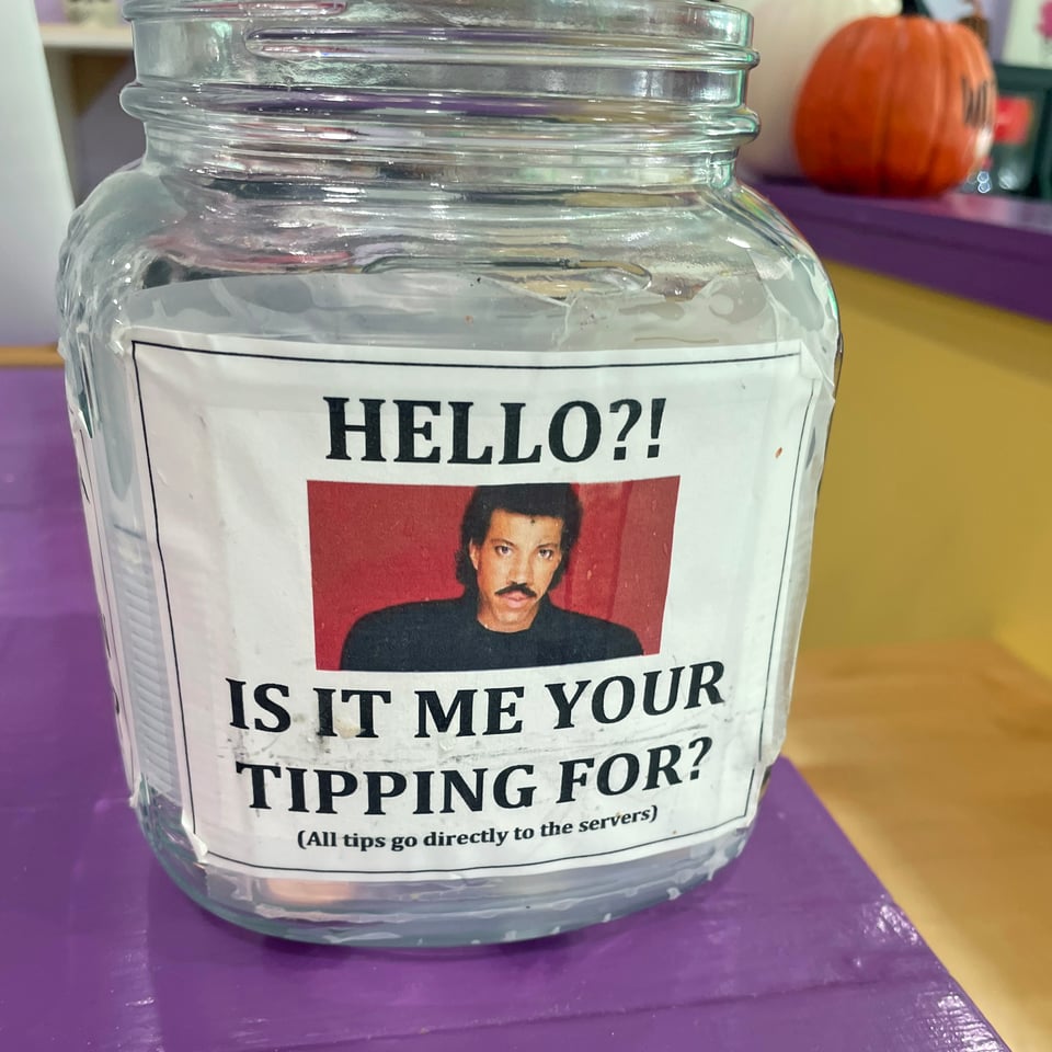 a jar that says hello is me your tipping for