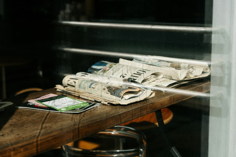 A stack of newspapers.