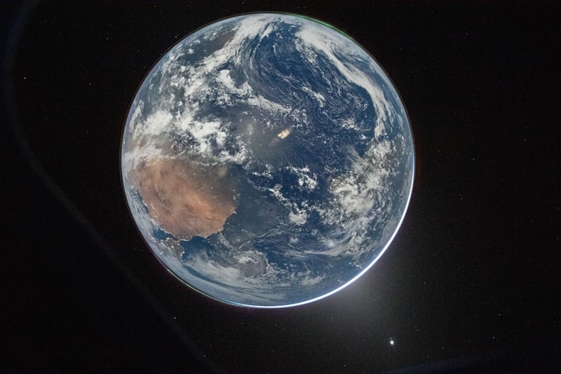 NASA/Reid Wiseman. A photo of Earth from space, showing Africa and South America.
