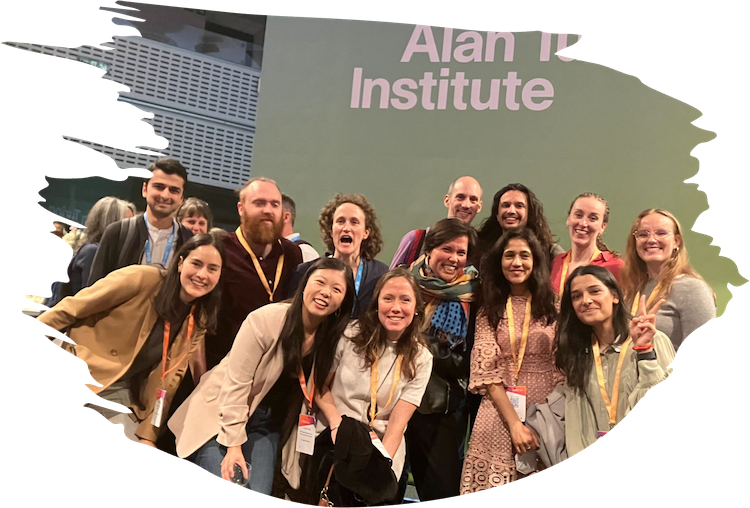 Alt: A group picture from the last day of AI-UK wit 12 people, laughing, smiling and posing for the camera.