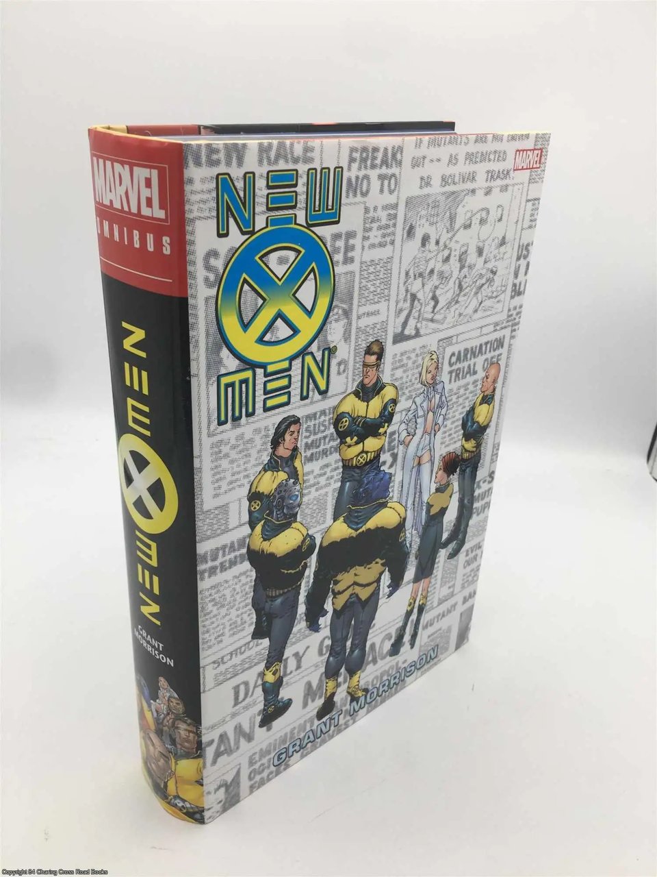 Hardcover copy of Grant Morrison's New X-Men Omnibus, standing up to show its immense presence
