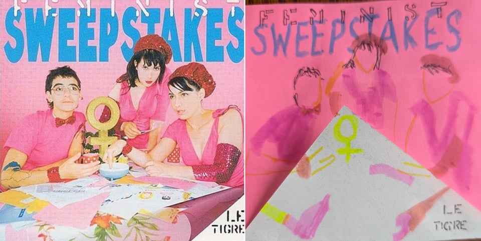A color photgraph of the members of Le Tigre: JD Samson, Johanna Fateman, and Kathleen Hanna. They are all dressed in pink and at a table covered with sheets of paper of various colors. At least one paper has a childlike drawing of people on it. There is a large gold Venus symbold on the table. Hanna is dipping her finger in a small bowl of something.