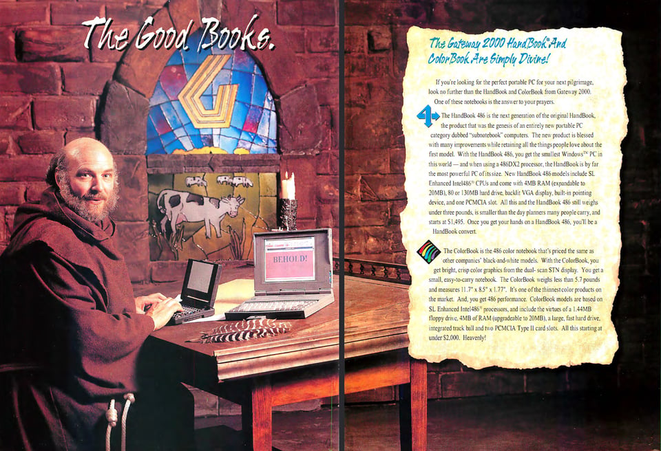 A man is dressed as a monk from the dark or middle ages. He is sitting at a desk with two Gateway 2000 laptops on them. The stained glass window in the background depicts a cow in a field and the headline reads "The Good Books."