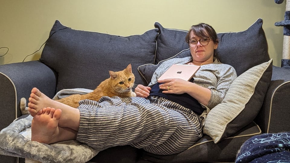 Von and Molly, sitting on a couch.