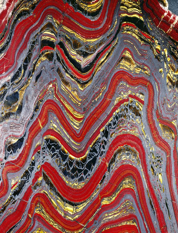 Banded iron formations are distinctive units of sedimentary rock consisting of alternating layers of iron oxides and iron-poor chert.
