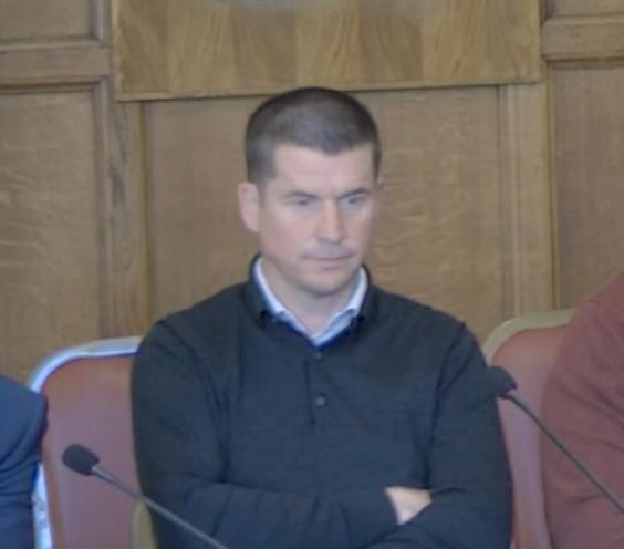 Mike Johnson stares into the distance