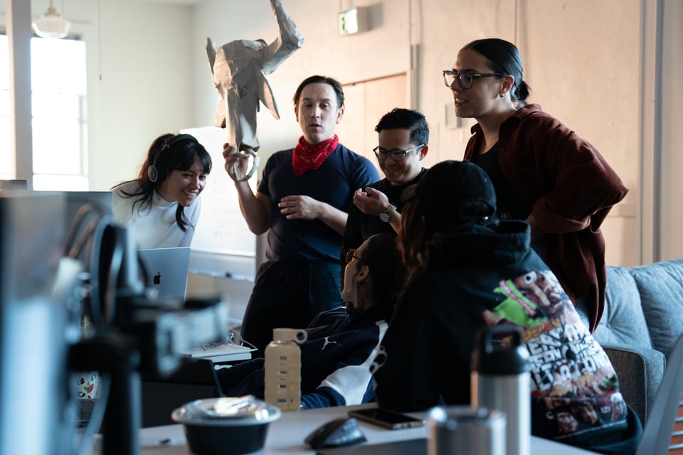A group of us excitedly looking at Allyson’s screen.
