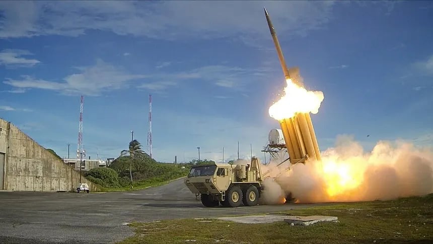 Image shows a THAAD launcher, firing off an missile interceptor