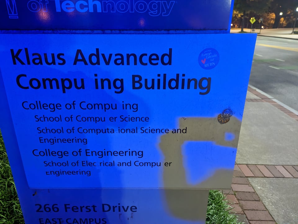 A sign from Georgia Tech University where all the Ts have been erased in the computer science department jargon