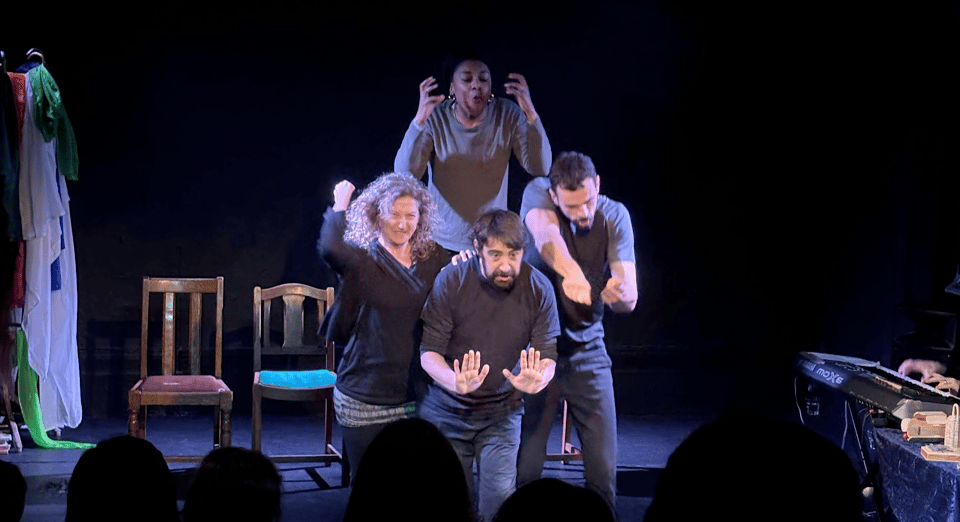 Playback theatre actors on a sculpture pose
