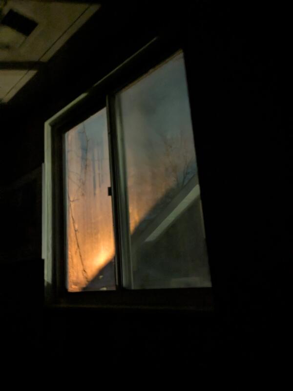 A window in a dark interior