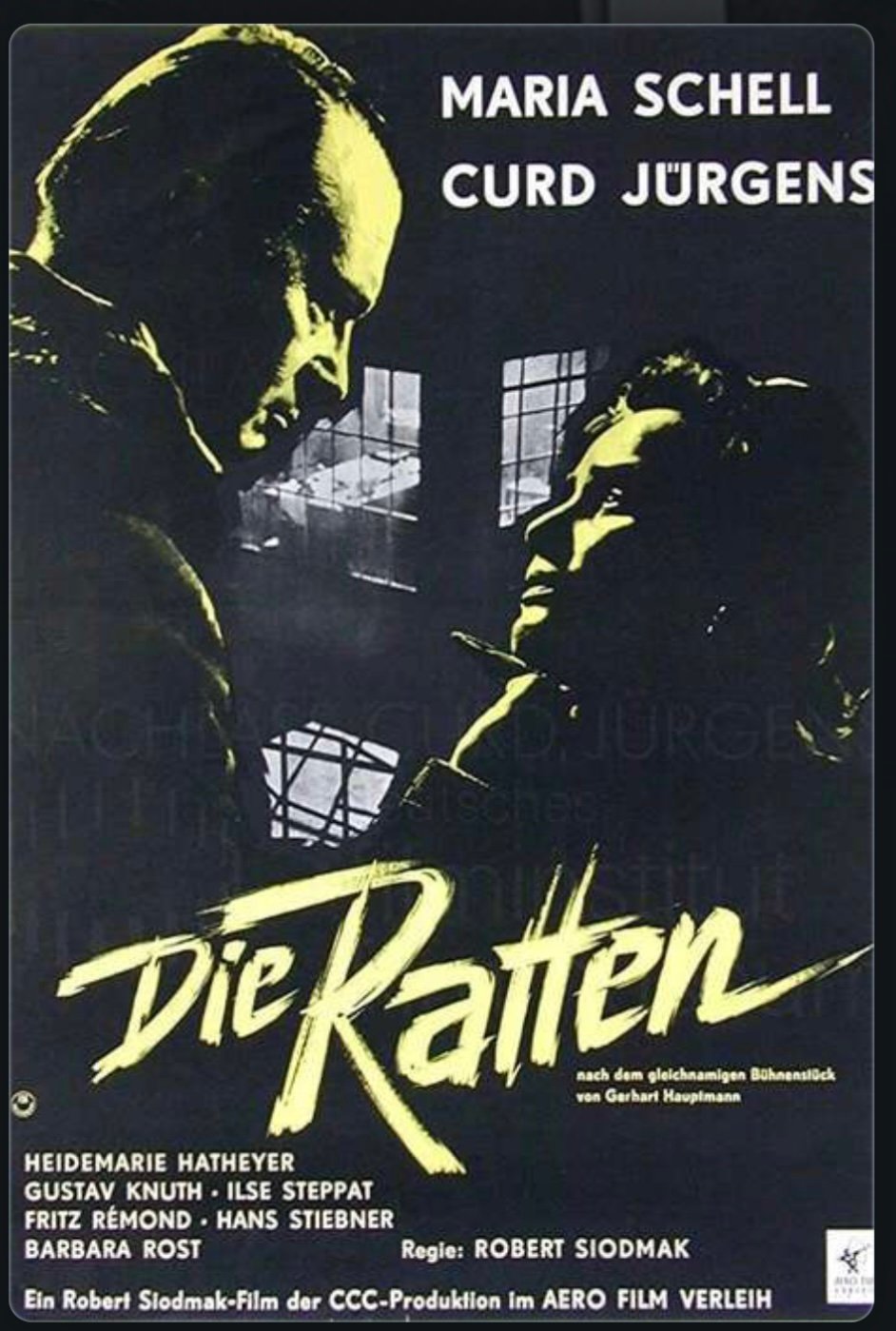 German Poster for The Rats featuring a man and a woman looking into each other‘s eyes against a stark urban background