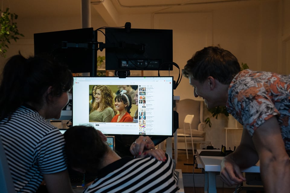 Another group watching a different screen.