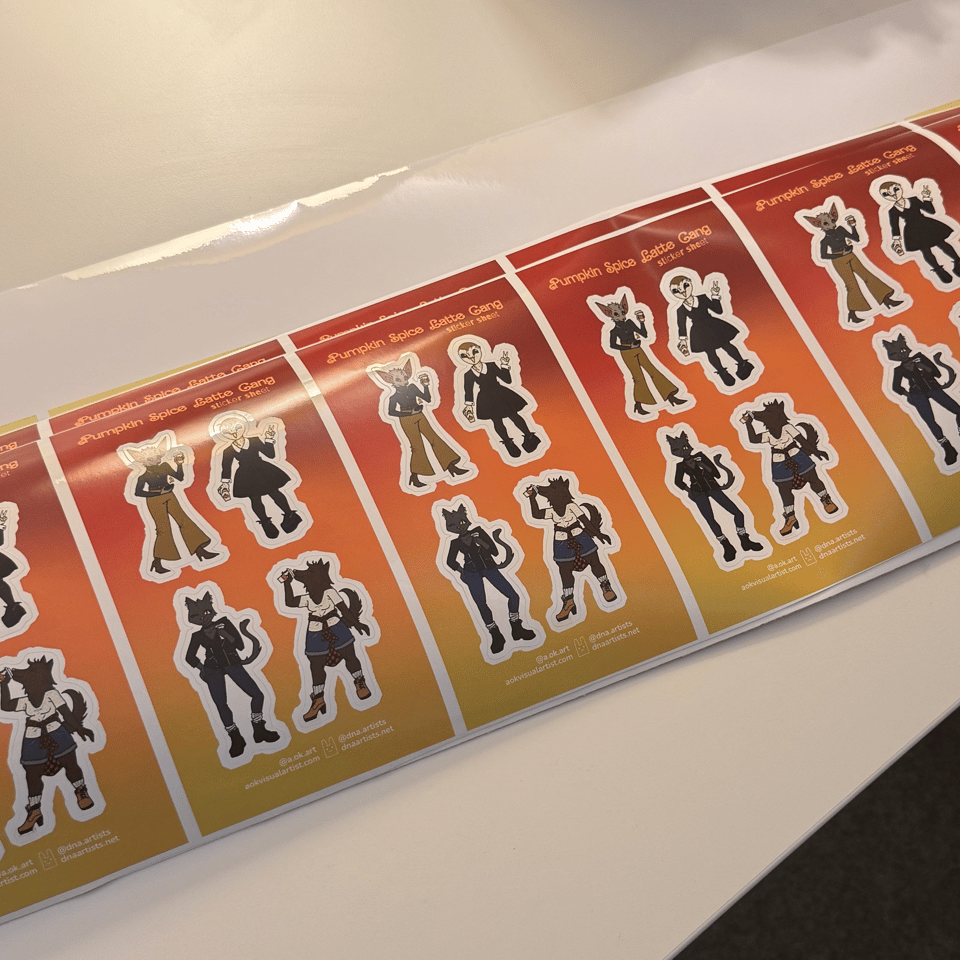 Image of uncut sticker sheets on a large piece of adhesive paper.