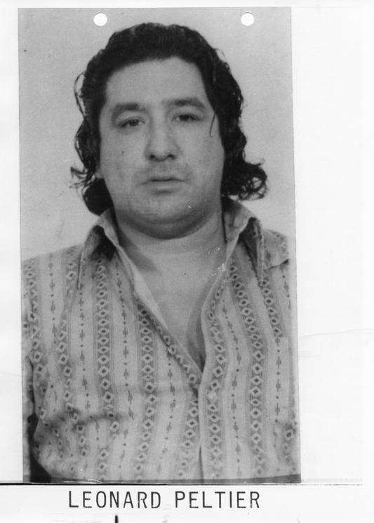 Former Ten Most Wanted Fugitive #335: On February 6, 1976, Peltier was arrested in Hinton, Alberta, Canada, by Royal Canadian Mounted Police. He was convicted of the murders of two FBI Special Agents,