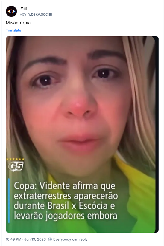 Post de Yin (@yin.bsky.social): Misantropia (Imagem de notícia intitulada: Copa: Vidente afirma que extraterrestres aparecerão durante Brasil x Escócia e levarão jogadores embora e com foto da tal vidente, uma mulher loira, com cara de choro)