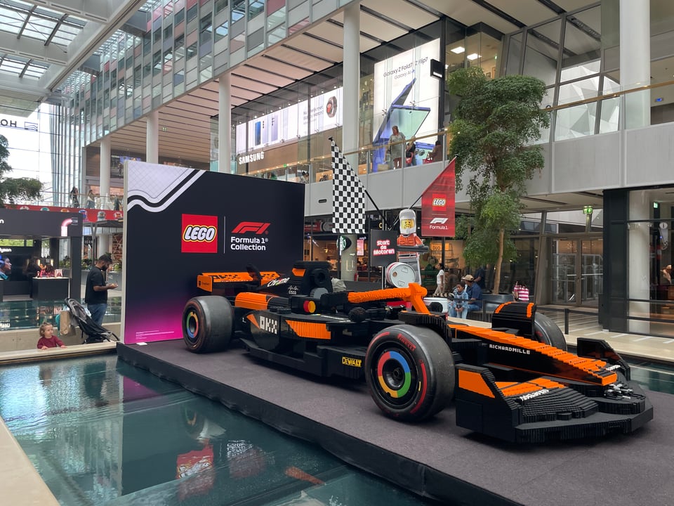 An almost life-sized formula one race car made of legos is on display in the center hall of the mall of Utrecht.