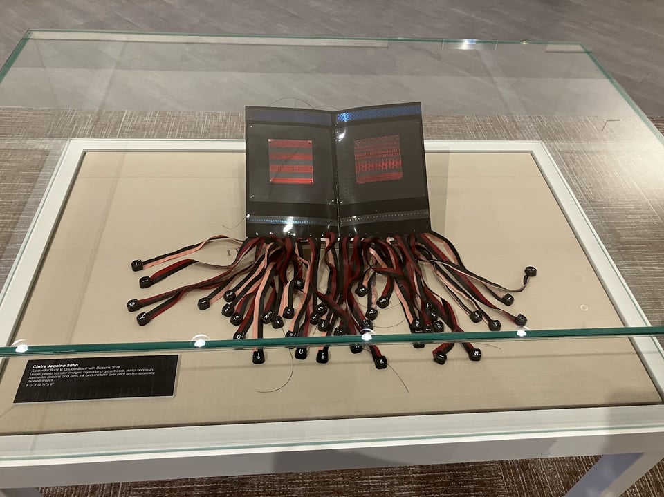 Special display of a typewriter art exhibit at the Main Library in the Miami-Dade Public Library System, using keys and ribbon.
