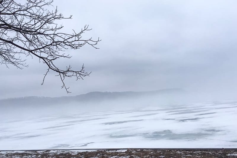 Fog obscures the waters of Lake Pepin in late winter/early spring. You can watch river ice diminish and disappear in the spring from the Old Frontenac beach or from many overlooks in Frontenac State Park. / Photo by Pamela Miller