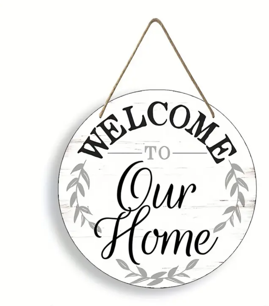 A welcome to our home sign