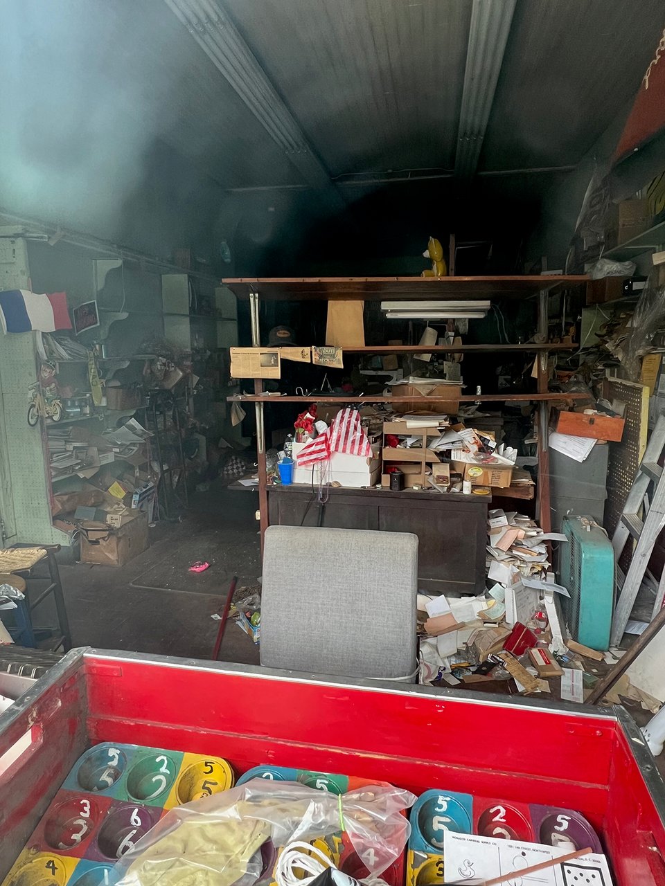 The inside of an untidy shop.