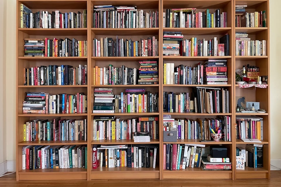 4 bookcases filled with books