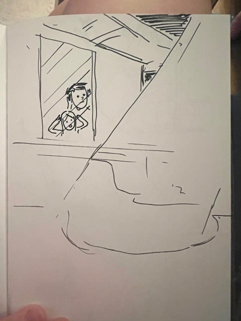 from the outside, me and my daughter looking out the window at a helicopter spotlight