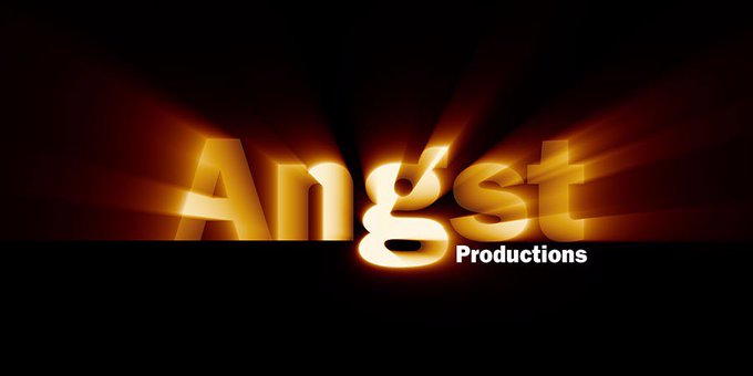 The words "Angst Productions" against a black background. "Angst" is in a large, sans serif font with yellow light shining through it.