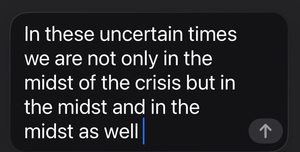 Text message on a dark background with white lettering. The text reads: "In these uncertain times we are not only in the midst of the crisis but in the midst and in the midst as well".