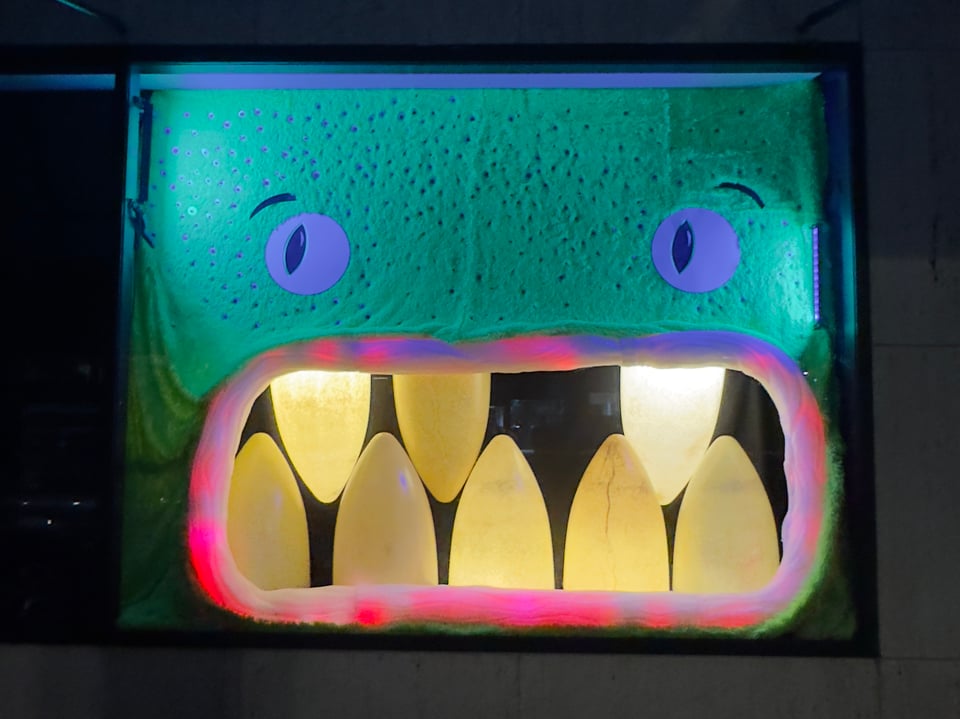 Monster sculpture in retail window