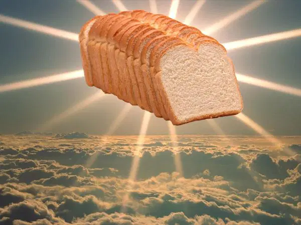 Sliced bread in the sky with a halo like light