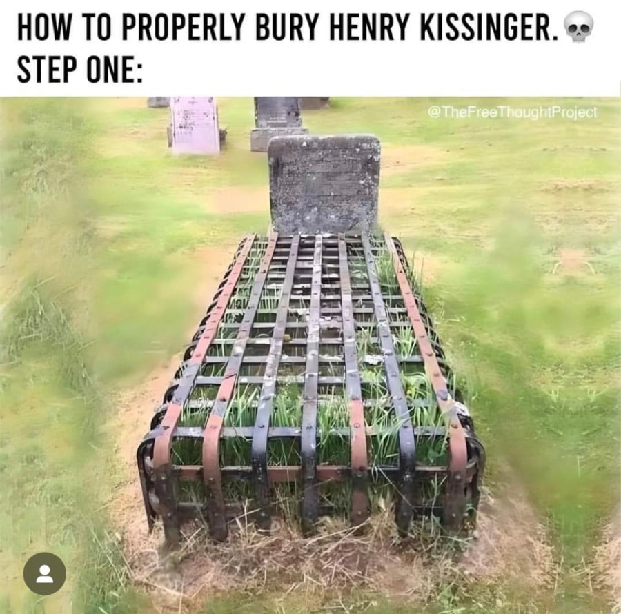 Text: How to properly bur Henry Kissinger. Below that is an image of a grave covered by a heavy cage made of metal.