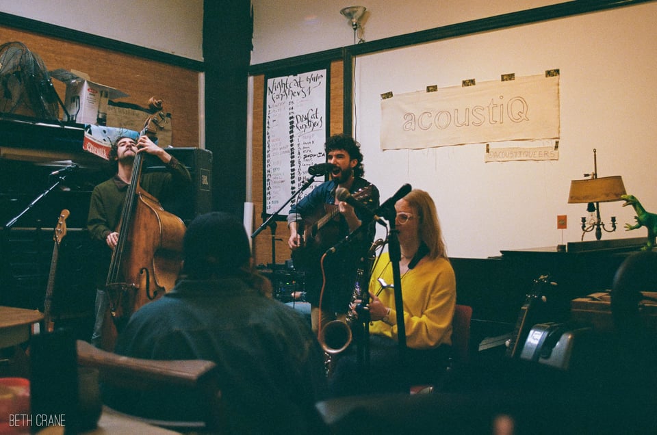 Dom on upright bass, Leche on guitar + vocals, Betty on sax, absolutely jamming at acoustiQ