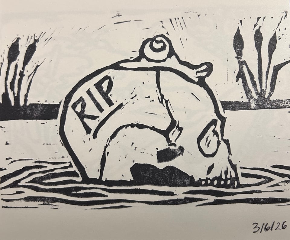 A linocut of a skull in shallow water, with a snail crawling across it. The word R.I.P. is scrawled across the back curve of the skull. Dated 3/6/26.