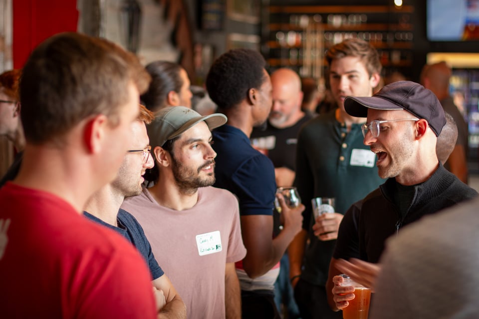 A group of hackers mill about during our recent kickoff event