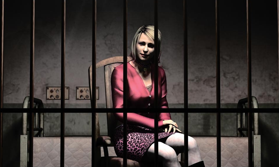 A woman in a red outfit seated inside a cell and looking at the player