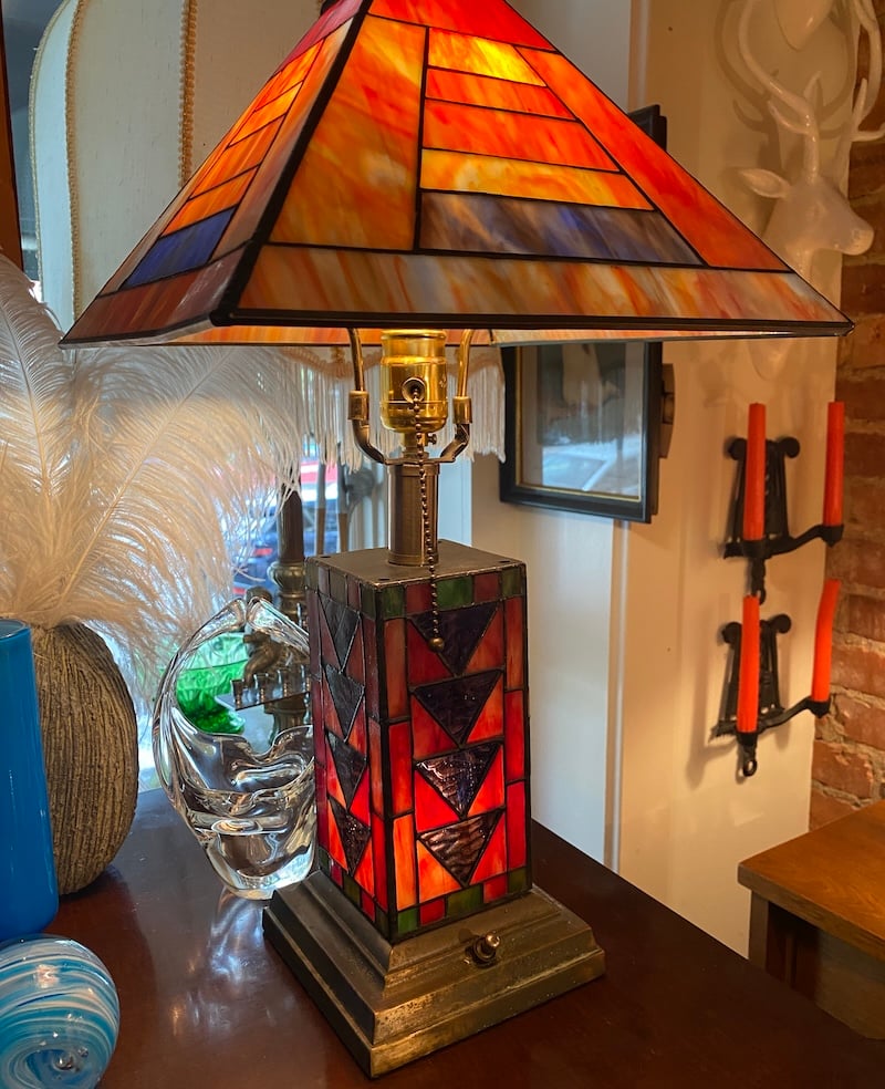 image of a lamp on a wooden dresser