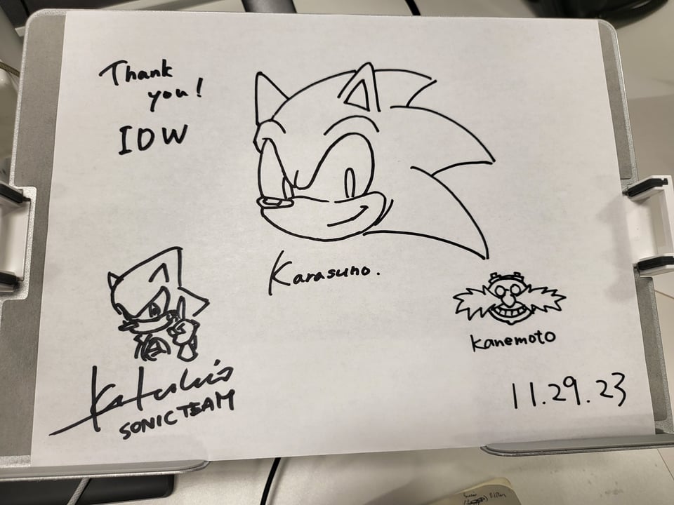 A picture of Sonic the Hedgehog, Metal Sonic, and Dr. Eggman, as sketched by Sonic Team. In the top left, it says "Thank you IDW"