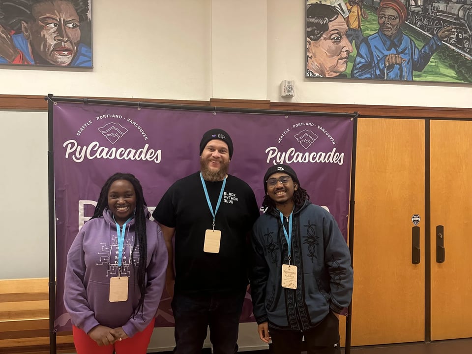 Laz and Velda and Nick Muoh at PyCascades