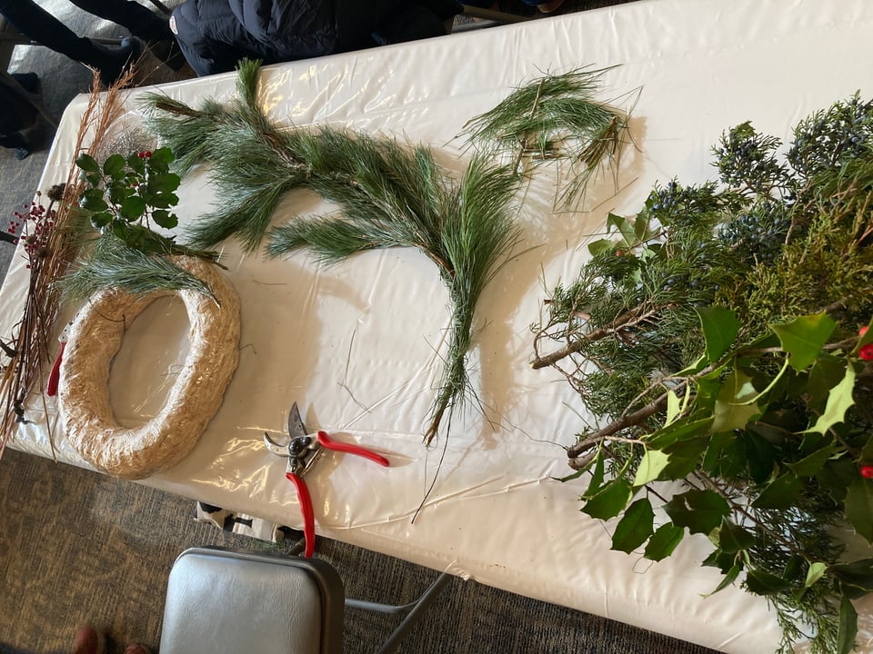 Wreath-making supplies on a table
