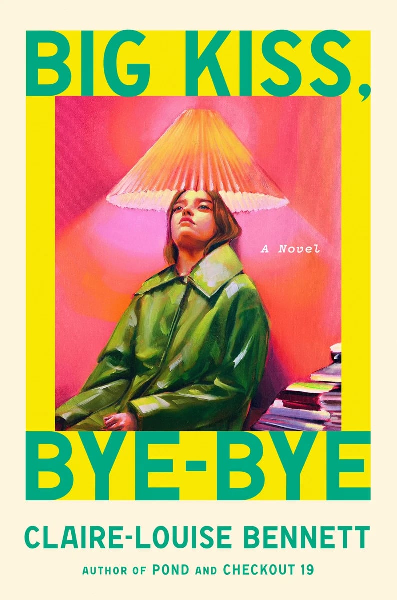 Beige border, then a yellow border, then a painting of a woman on the innermost rectangle. Fuschia background, white woman in a green coat leaning against the wall with a lampshade hanging right over her head and illuminating her. Pile of books to her left. In yellow border: BIG KISS, BYE-BYE. In beige: CLAIRE-LOUISE BENNETT / AUTHOR OF POND AND CHECKOUT 19