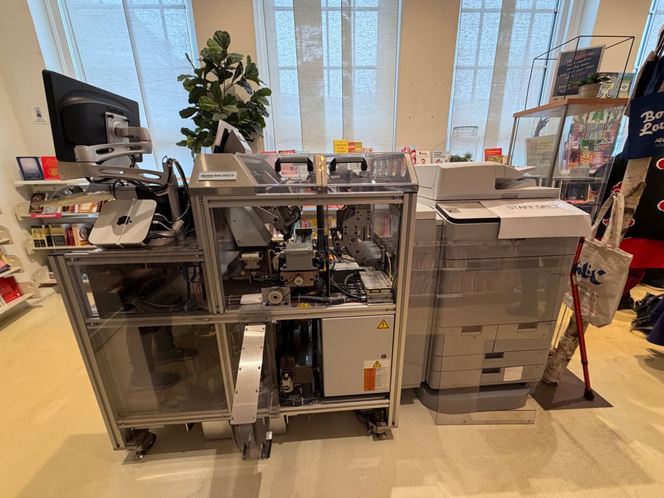 The Espresso book machine is a combination of printer and binder machines all in one that requires a fair bit of technical knowledge to keep running smoothly.