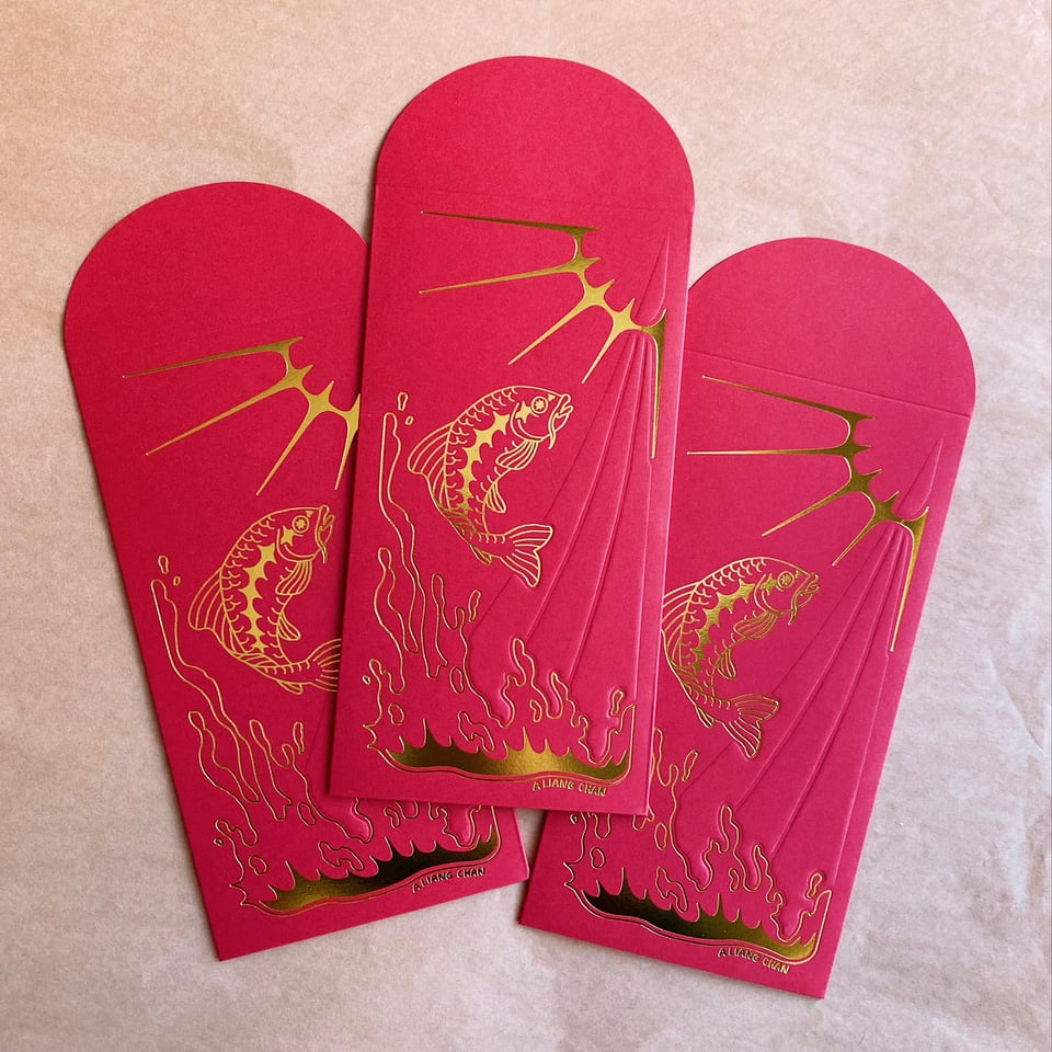 3 red envelopes with gold foil carp designs