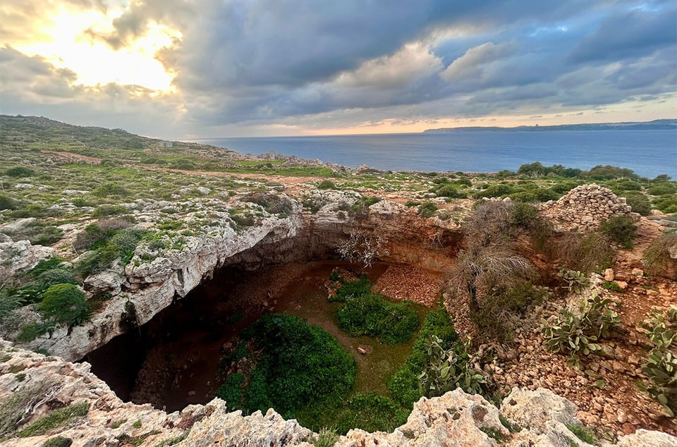 A sunken cave along an ocean shoreline