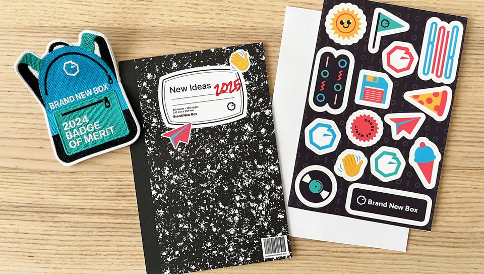 This year’s card, badge of merit, and new this year: stickers!